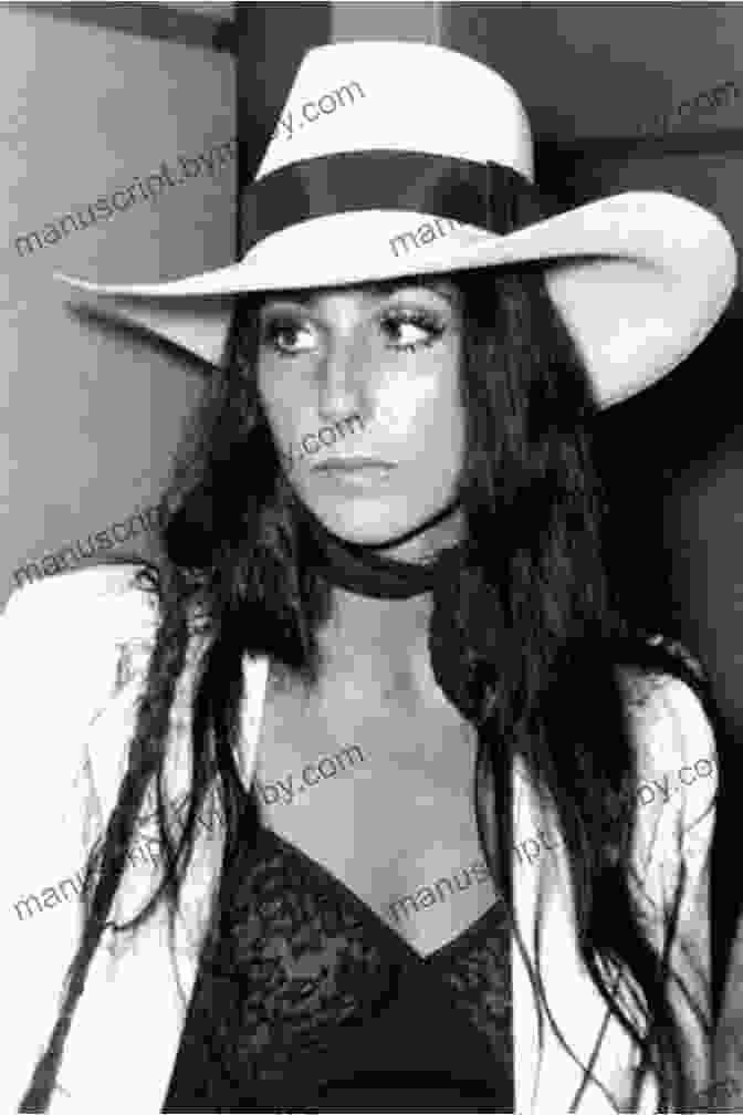 Cher, The Iconic Singer, Actress, And Fashion Icon, In A Glamorous Pose Cher: The Unauthorized Tell All Biography