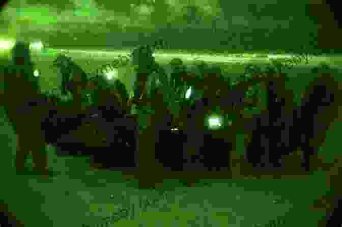 Soldiers Using Night Vision Devices During A Reconnaissance Mission. U S Army Reconnaissance And Surveillance Handbook (US Army Survival)